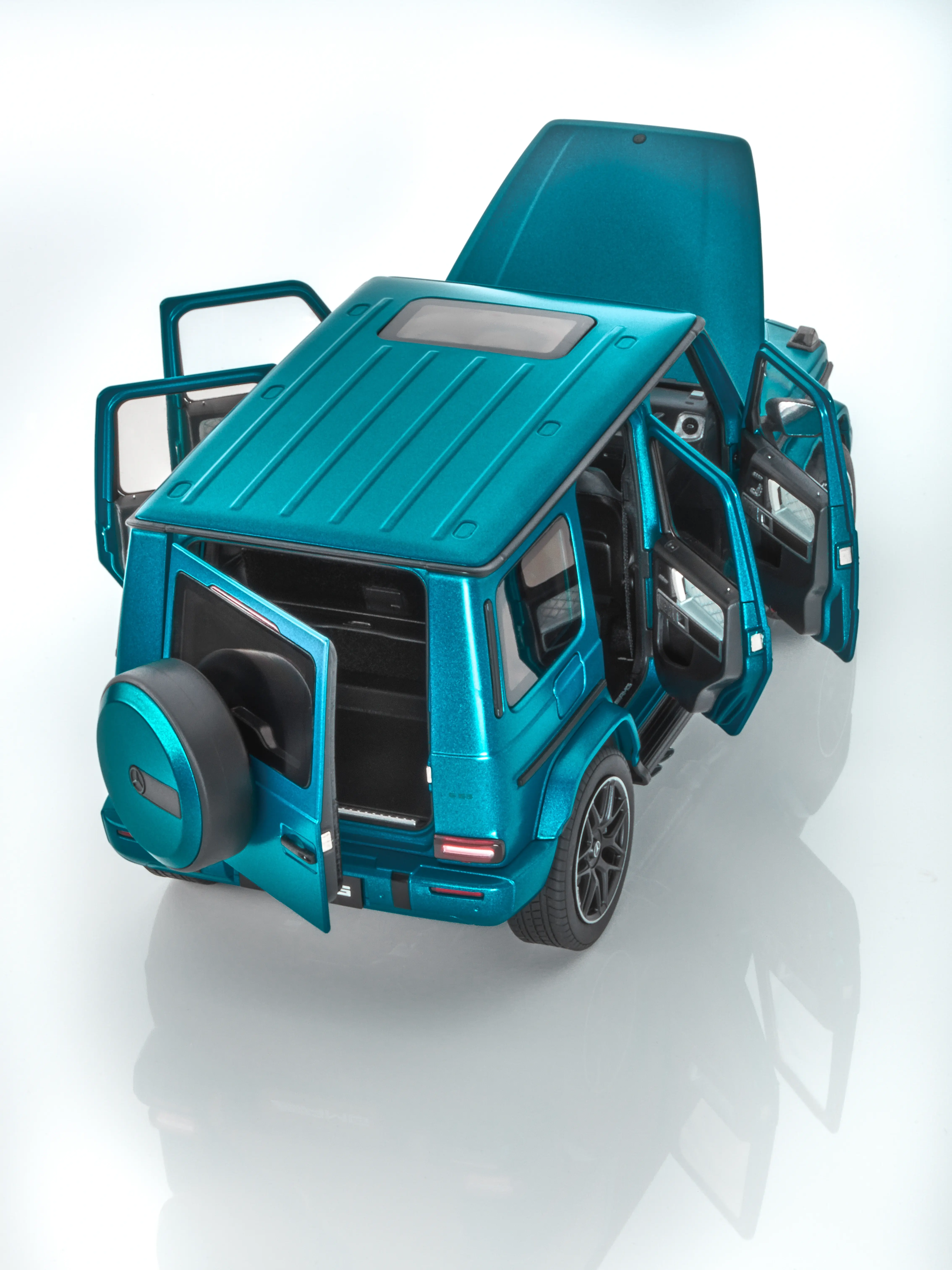 Modellauto: Mercedes-AMG G 63, Geländewagen, W465, MANUFAKTUR hyper blue magno, NZG, 1:18, B66961520 Modellauto: Mercedes-AMG G 63, Geländewagen, W465, MANUFAKTUR hyper blue magno, NZG, 1:18, B66961520