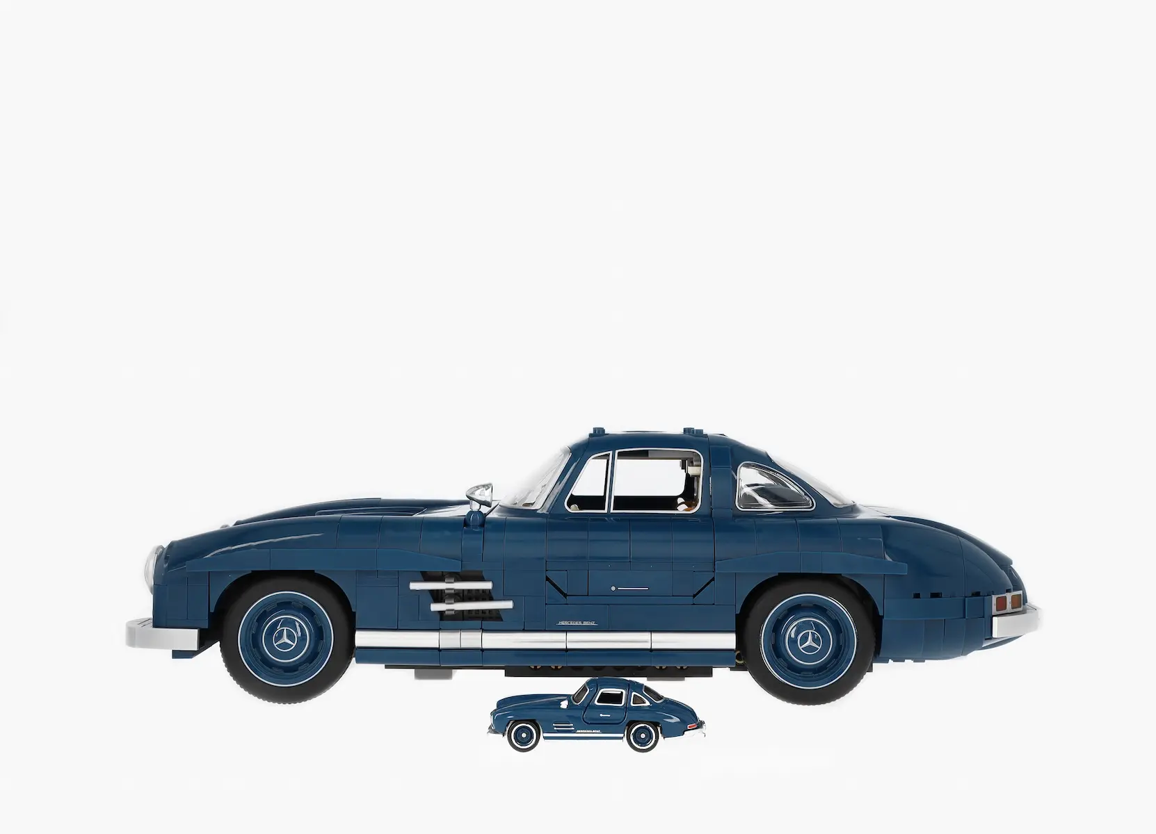 Modellauto: 300 SL W 198 (1954-1957), Klemmbaustein Modell, blau, Mattel, 1:12, B66041219 Modellauto: 300 SL W 198 (1954-1957), Klemmbaustein Modell, blau, Mattel, 1:12, B66041219