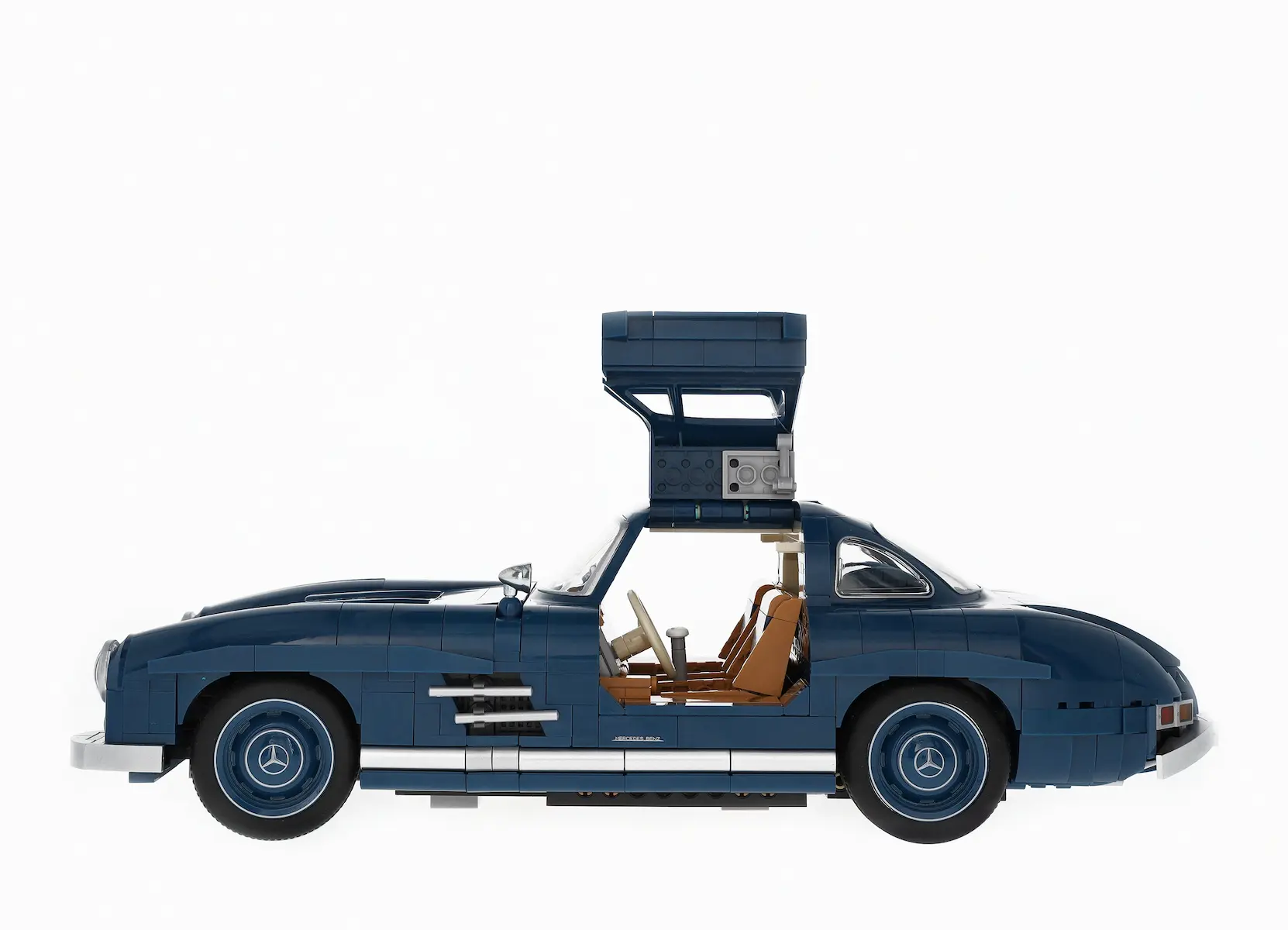 Modellauto: 300 SL W 198 (1954-1957), Klemmbaustein Modell, blau, Mattel, 1:12, B66041219 Modellauto: 300 SL W 198 (1954-1957), Klemmbaustein Modell, blau, Mattel, 1:12, B66041219